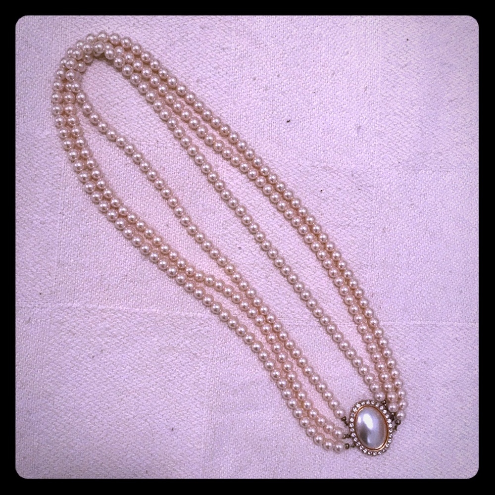 Vintage costume pearls with medallion